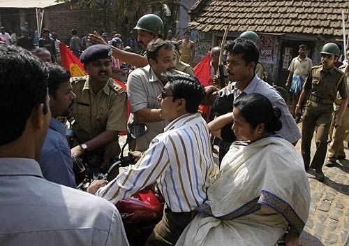 Mamata Banerjee riding pillion to visit violence affected people in Tamluk, Nandigram. 