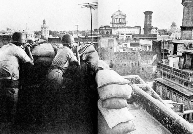 Snipers taking aim from buildings, overlooking the streets leading to the Temple. [Credits: 47roots.com]