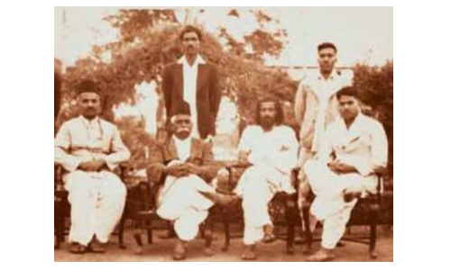 The Early RSS Team. Sitting (L-R): Appaji Joshi, Dr KB Hedgewar, MS Golwalkar and Buban Rao Pandit. Standing (L-R) Vithal Rao Patki and Balasaheb Deoras are also seen (standing)
